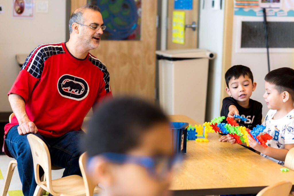 SP Kencrest 2025-2 A teacher with students at KenCrest's Early Learning Centers. // Photo by Rae Hearts Design