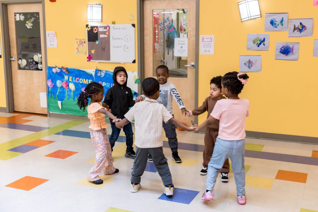 Six Children Standing in a Circle