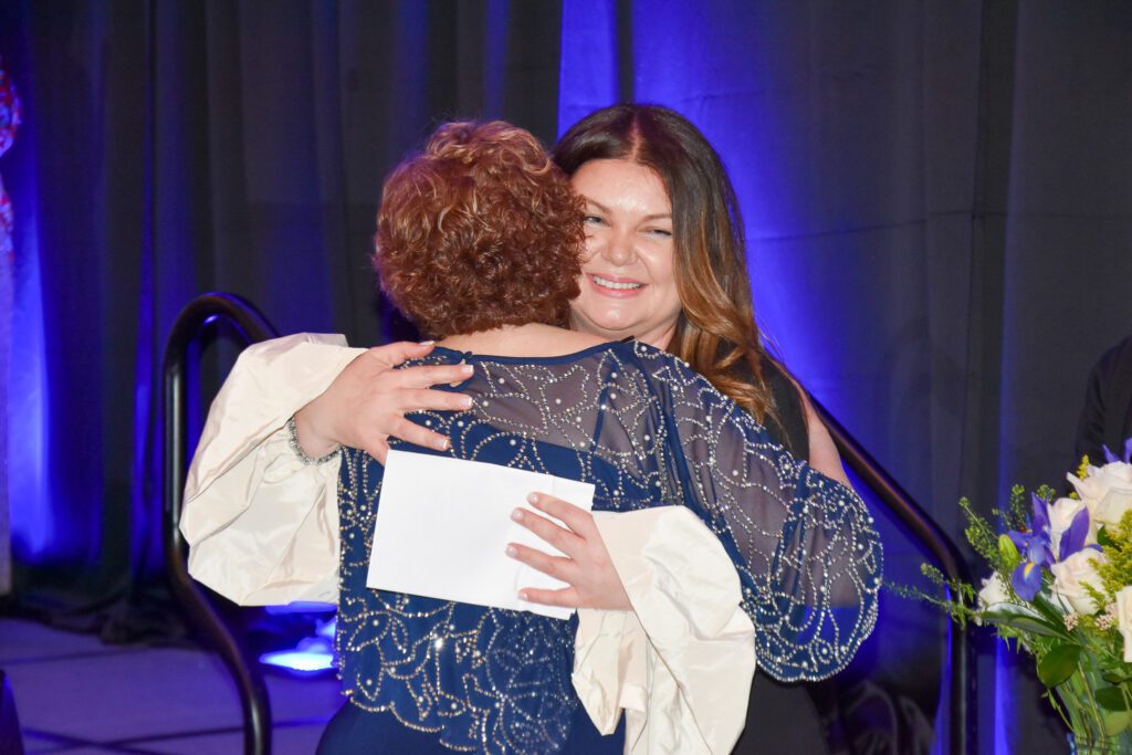 Marian and Aurora hugging