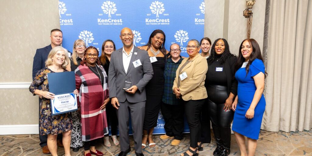 First Up receiving their award at the 10th annual Community Champions. // Photo by Rae Hearts Design & Photography